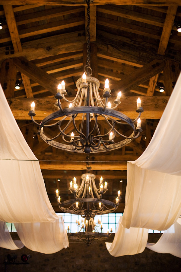 iron chandeliers - wedding photo by Melissa Jill Photography